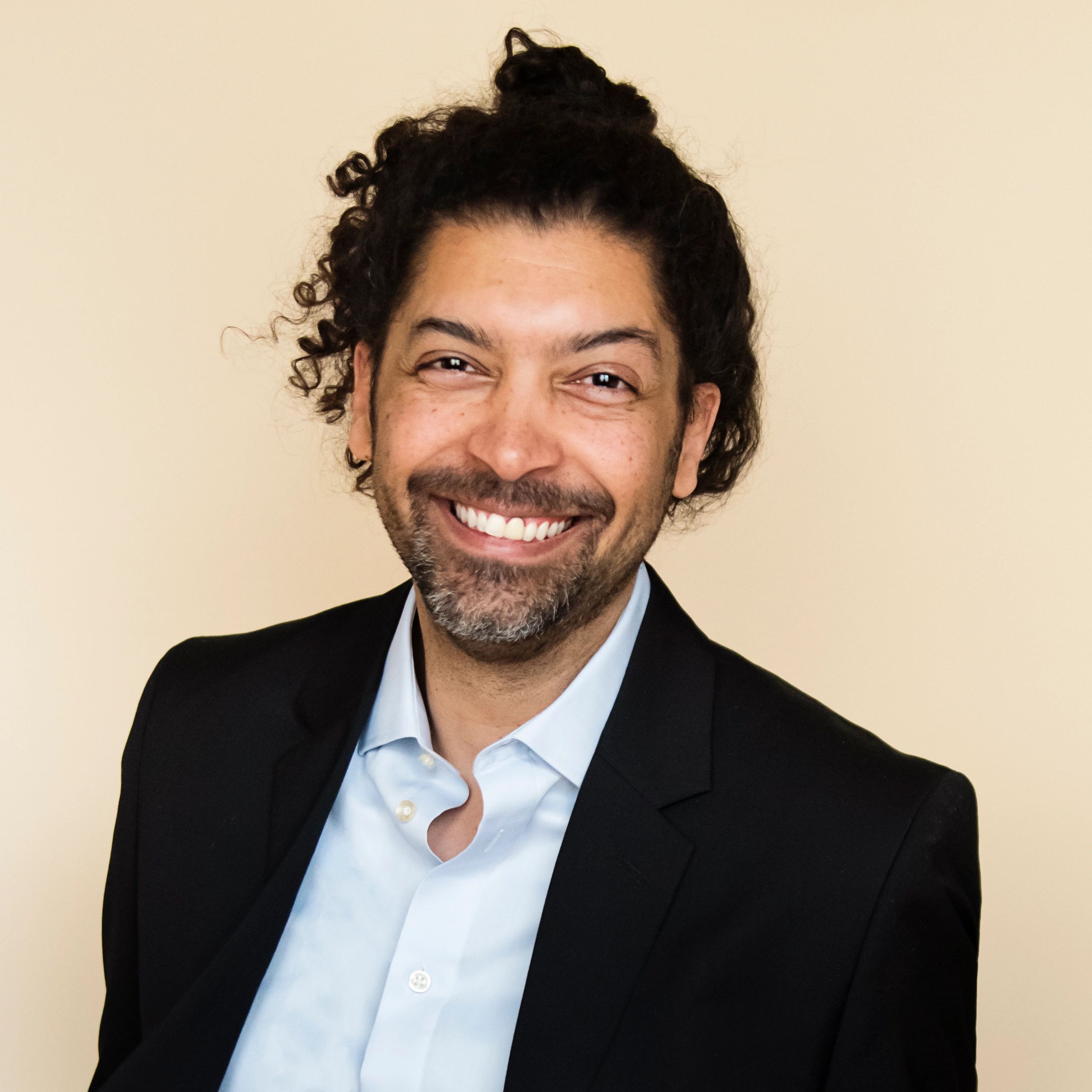 Professional headshot of a creative professional