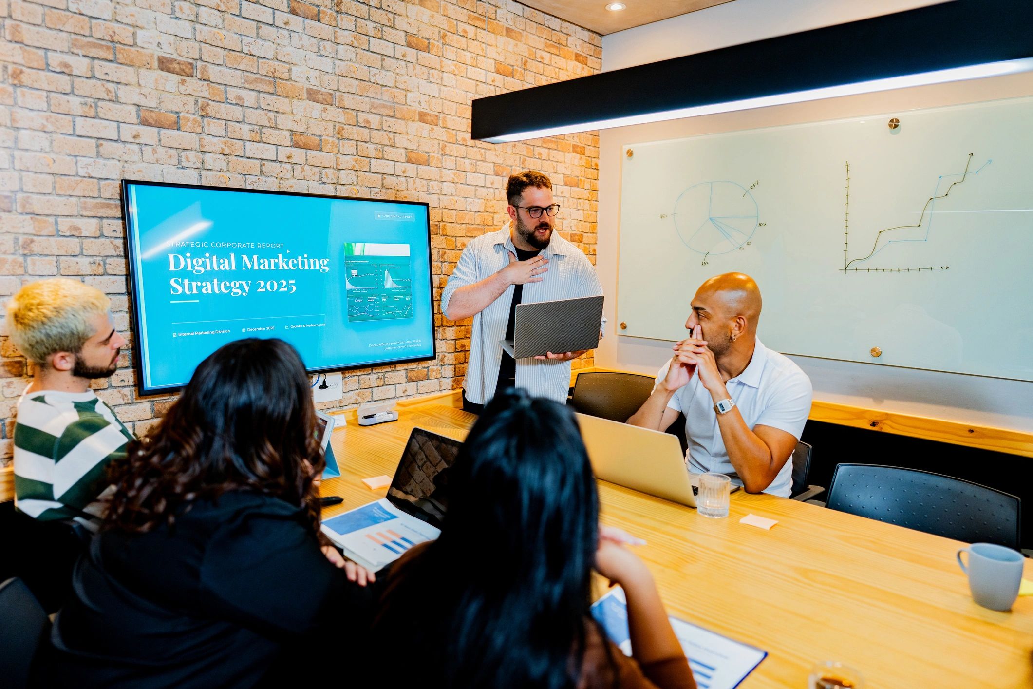 Marketing team presentation in a modern meeting room